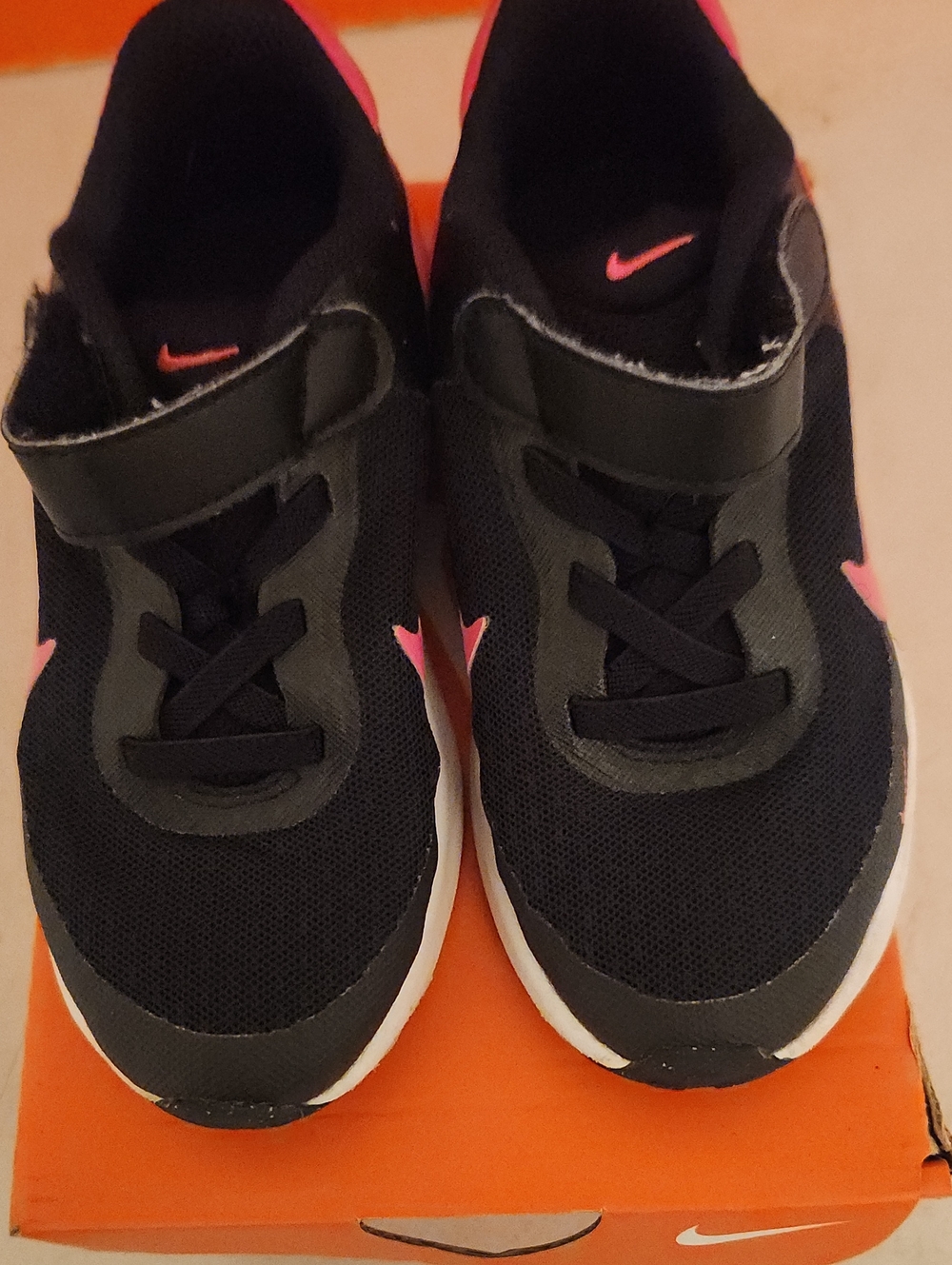 Nike Kids Black Sneakers with Pink Swoosh Accents